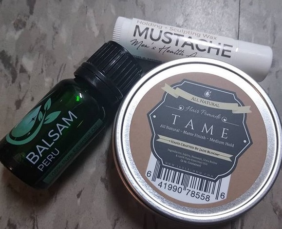 A real photo of TAME Pomade - Tin Can w/ Screw Top - 2 Ounces by Jason Bartlett (1)